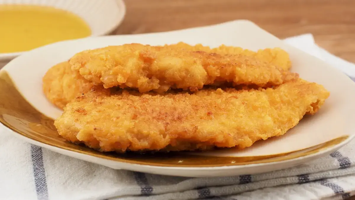 For The Most Flavorful Frozen Chicken Tenders, Add One Buttery Ingredient (It's So Easy)