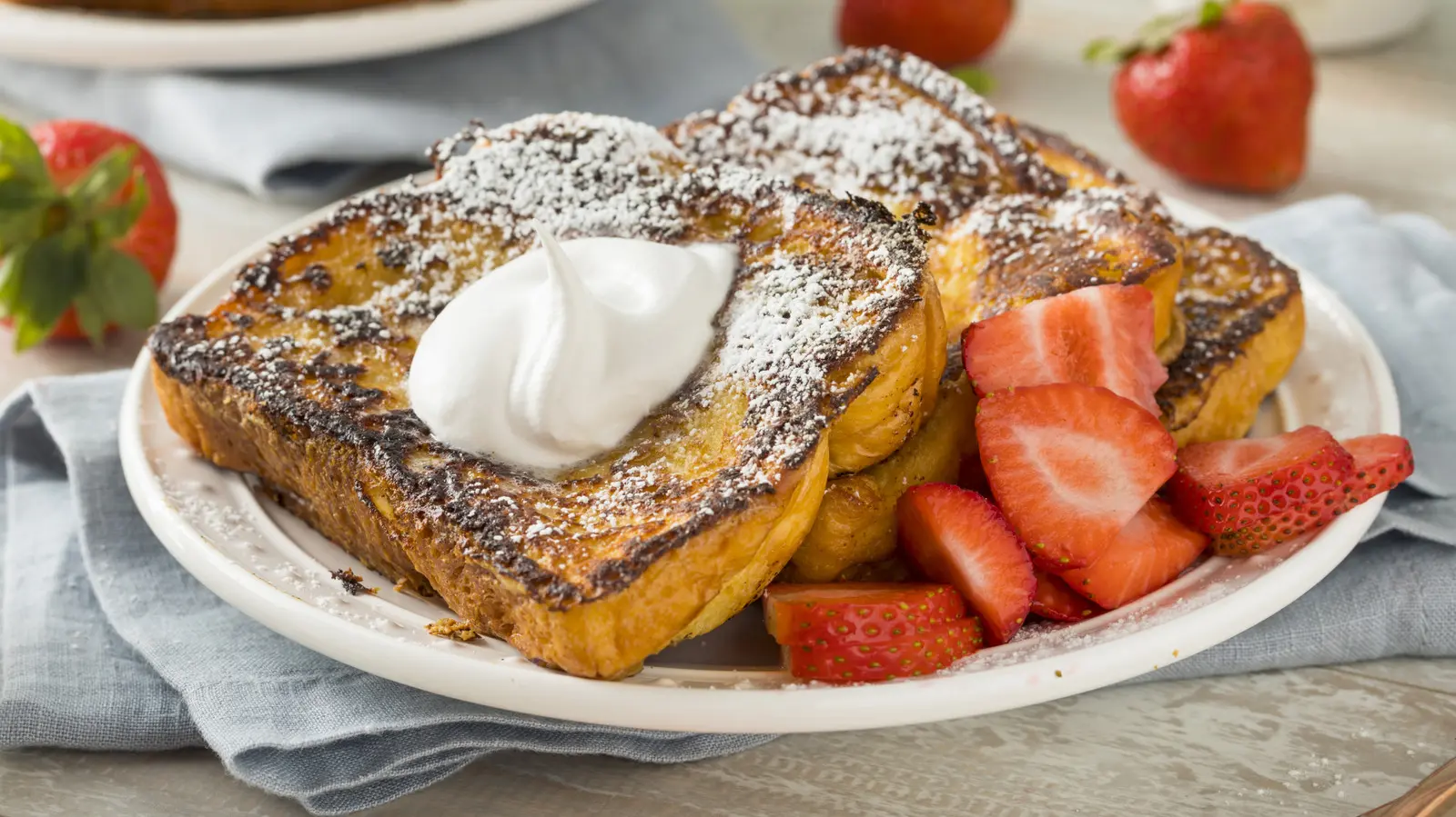 French Toast Gets A Flavor Boost From This Creamy Staple In Your Fridge