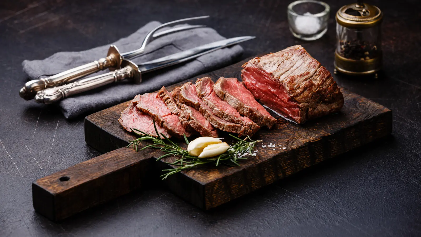 Use Up Leftover Roast Beef By Making Baked Potatoes Into A Hearty Comfort Dish