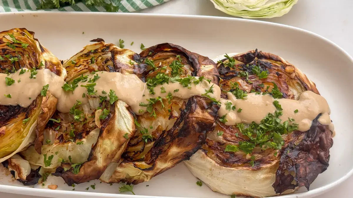 Roasted Cabbage Steaks with Miso Tahini Drizzle