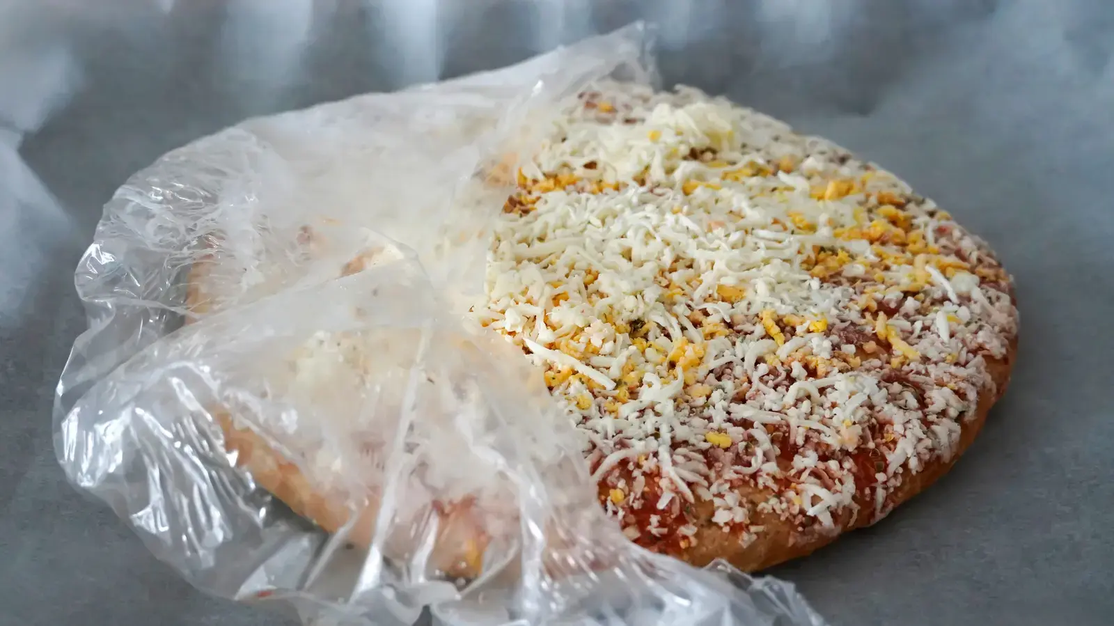 This Nostalgic Frozen Pizza Brand Faces Ongoing Imitation Cheese Debate