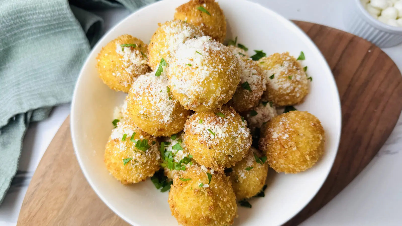 Crispy Golden Potato Bites Hide a Rich Cheese Center