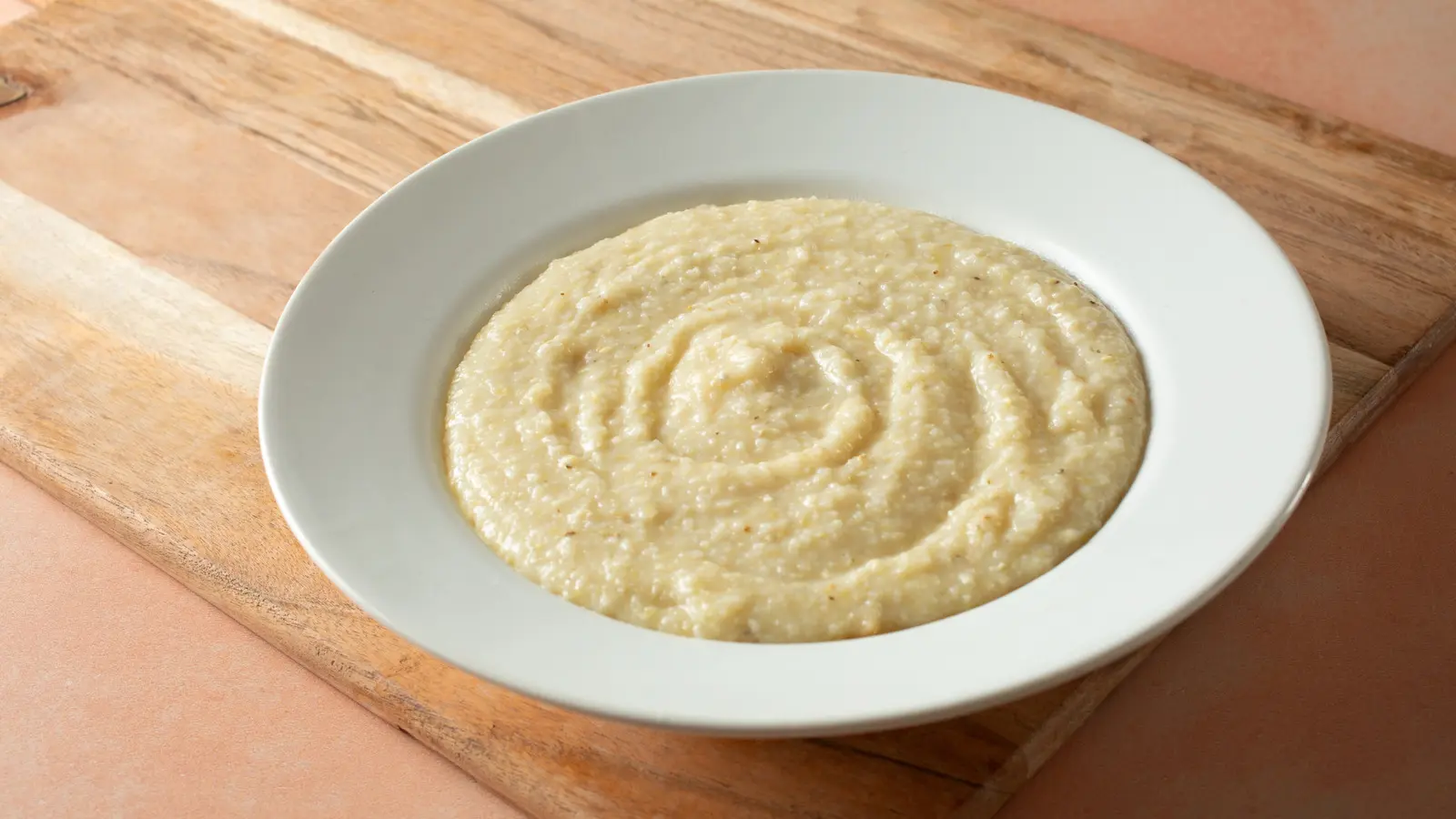 Grits Become Creamier Comfort Food With One Fridge Ingredient