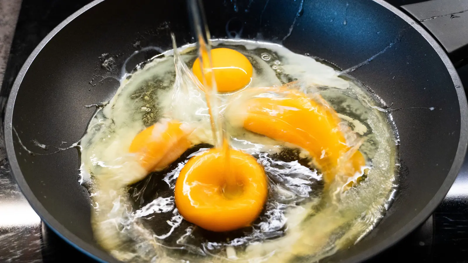 Step Away From The Pan: Your Fried Eggs Will Be Ruined If You Crack Them Like This