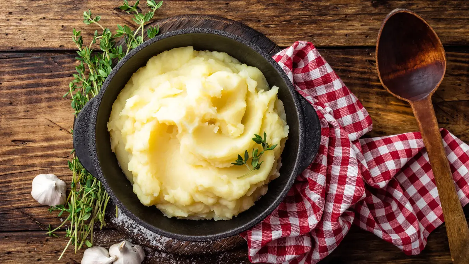 Forget Heavy Cream: Use This Rich Ingredient Instead For More Flavorful Mashed Potatoes
