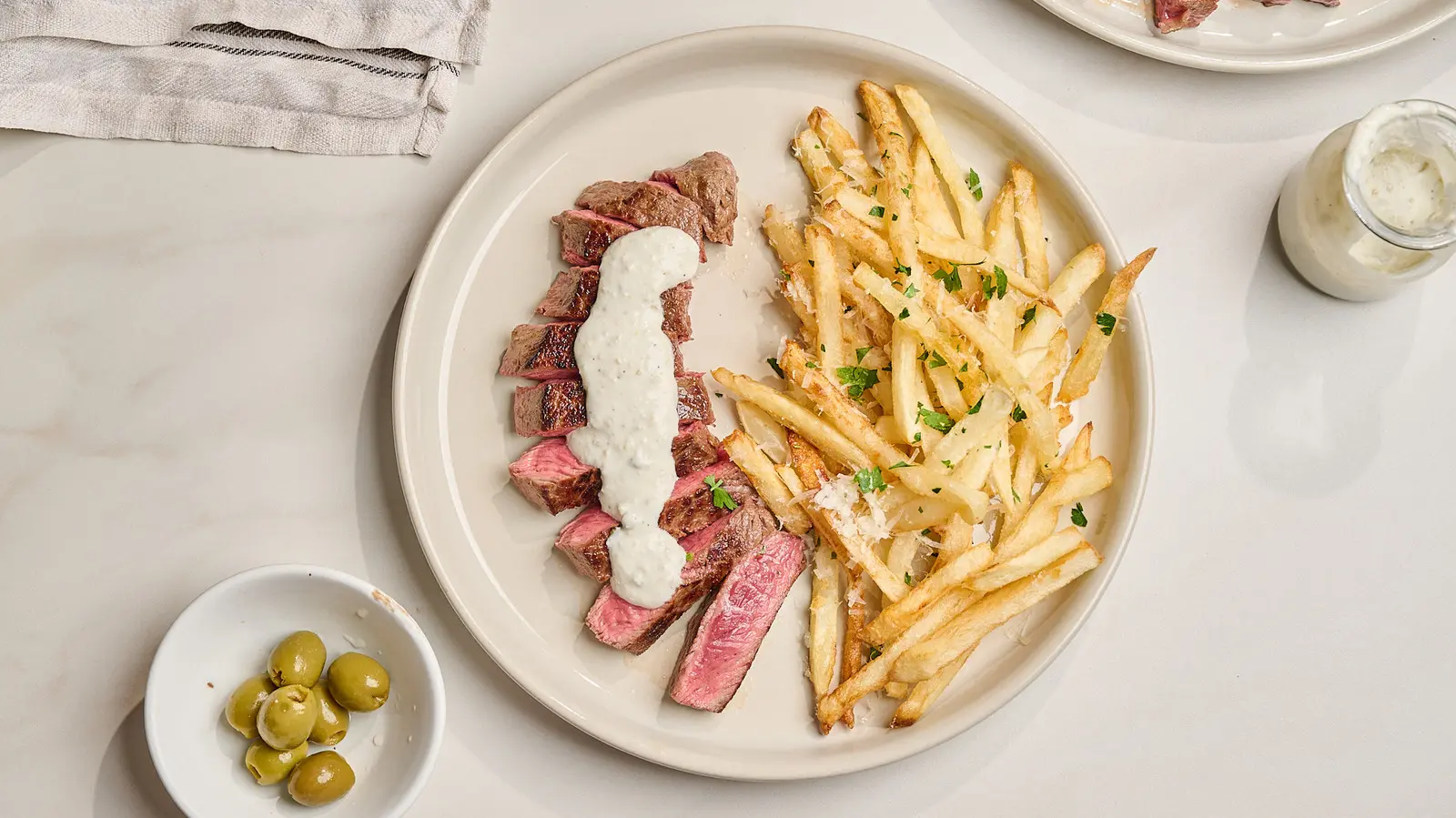 Dirty Martini Flavors Meet Steak Frites in New Culinary Trend