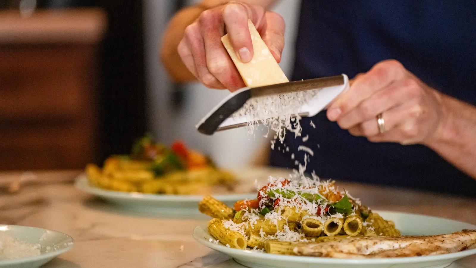The Major Mistake Almost Everyone Makes When Adding Cheese To Pasta (It's So Simple)