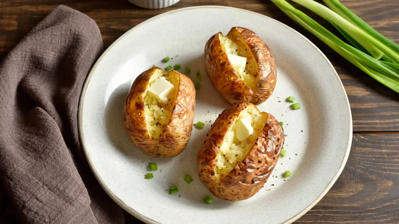 Turn Baked Potatoes Into The Ultimate Comfort Meal By Adding This Creamy Canned Ingredient