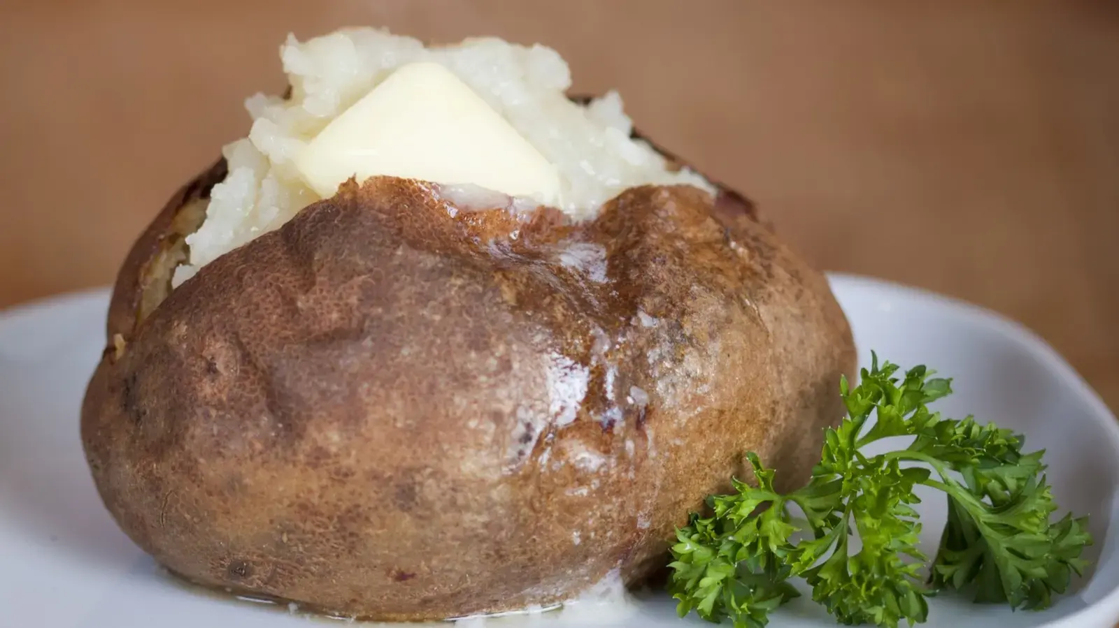Turning Baked Potatoes Into A Complete Meal With One Simple Salad