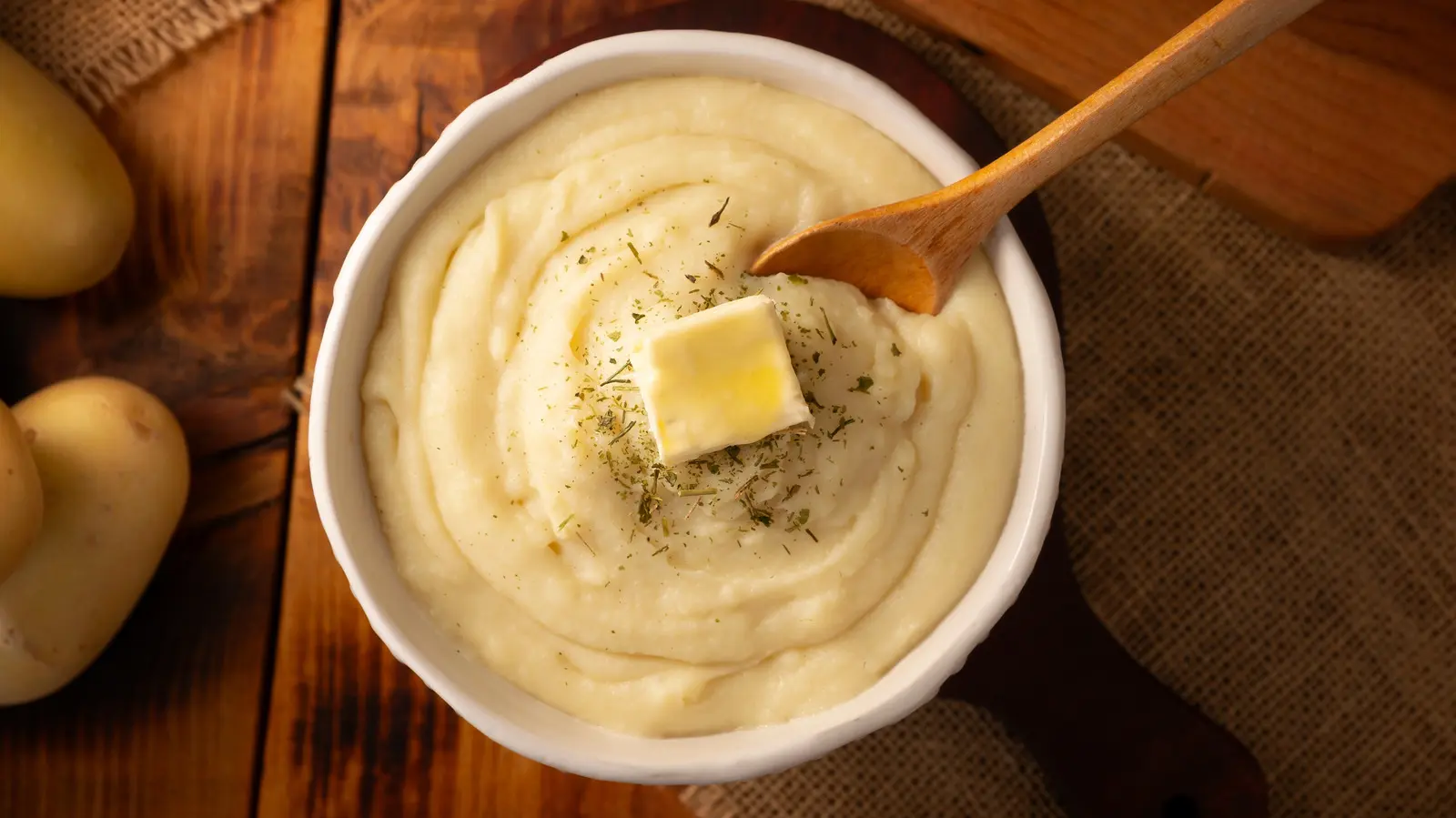 Everyone Will Rave About Your Mashed Potatoes If You Mix In This Tangy Condiment From Your Fridge