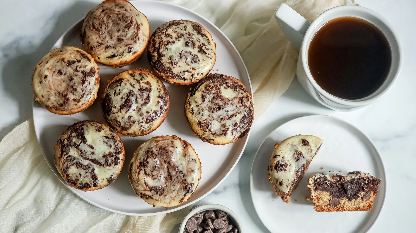 Cheesecake Brookie Muffins Blend Three Desserts Into One Indulgent Bite