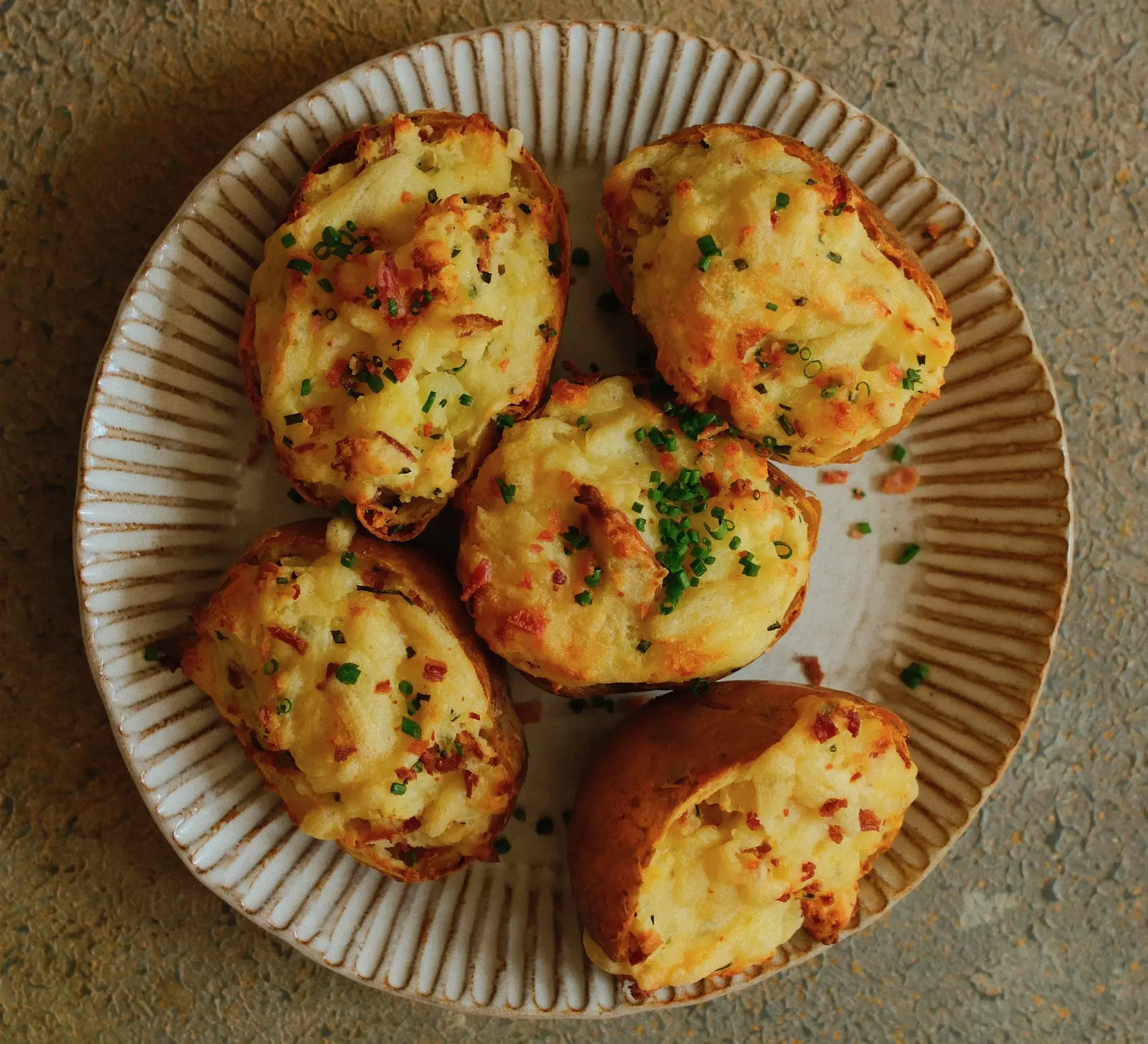 Double‑Baked Potatoes with Bacon, Chives, Sour Cream and Cheddar