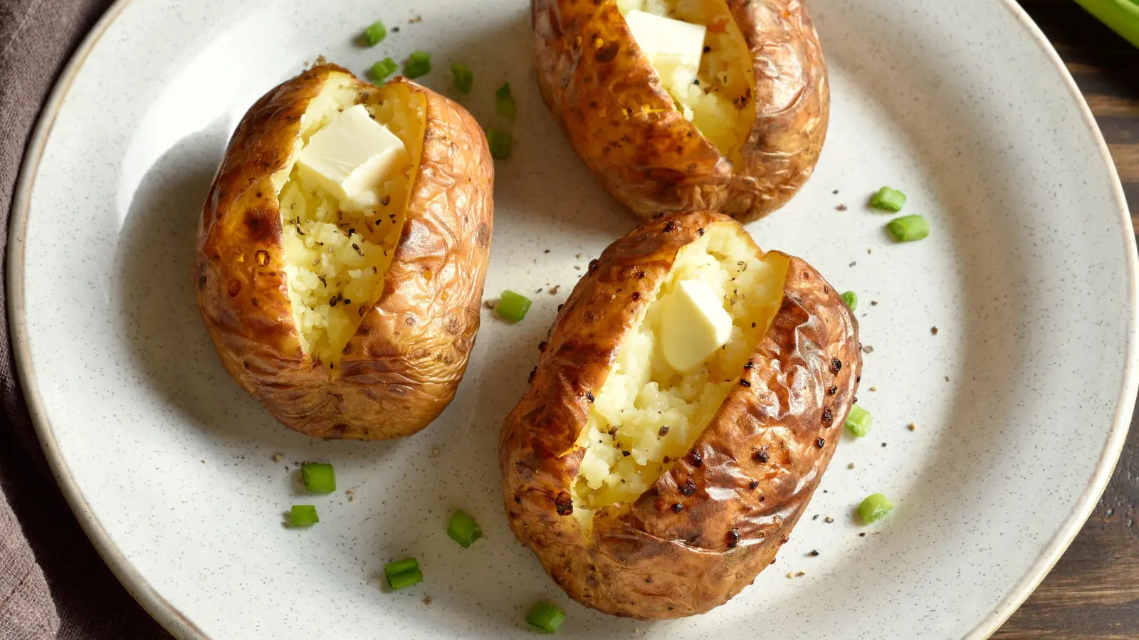 The Freezer Aisle Trick That Turns Baked Potatoes Into A Full Meal For Under $5